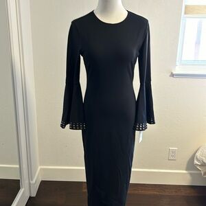 Black midi dress by Hale Bob, flattering with embellished bell sleeves